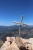 Gipfelkreuz mit Kritzelinschrift (Foto: chari , Capu d'Orto, Korsika, Frankreich am 03.06.2019) [5172]