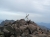 am Gipfelkreuz des Monte Cinto (Foto: chari , Monte Cinto, Korsika, Frankreich am 28.09.2012) [3581]